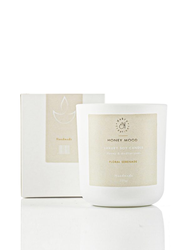 Honey and Mediterraneo scented soy candle in a glass jar