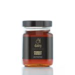 Jar of raw Greek forest honey from mountain trees