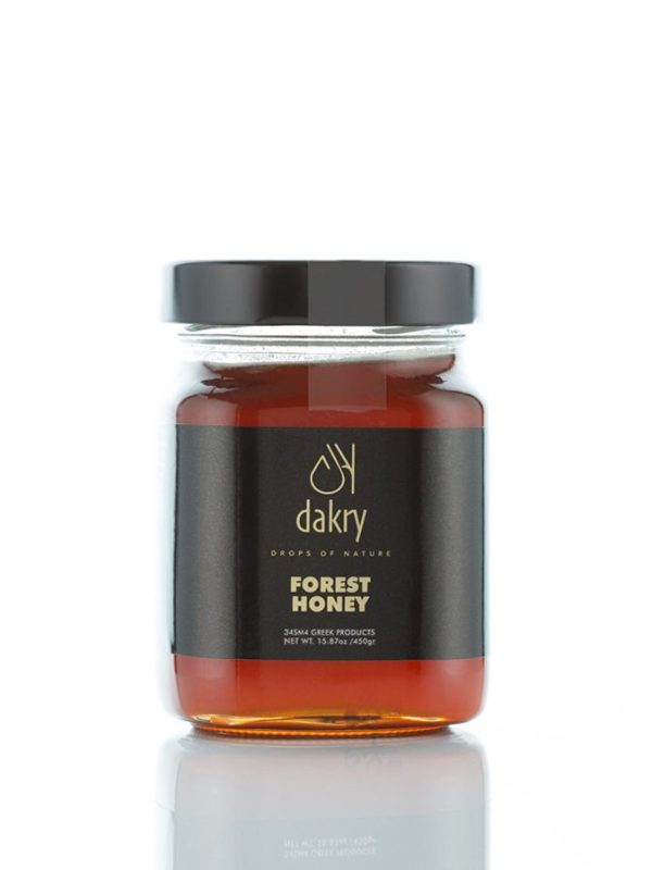 Jar of raw Greek forest honey from mountain trees