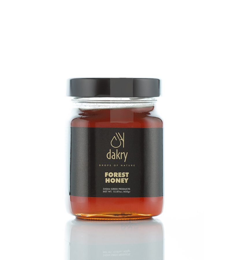 Jar of raw Greek forest honey from mountain trees