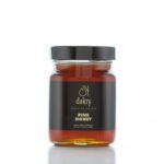 Jar of dense Greek pine honey