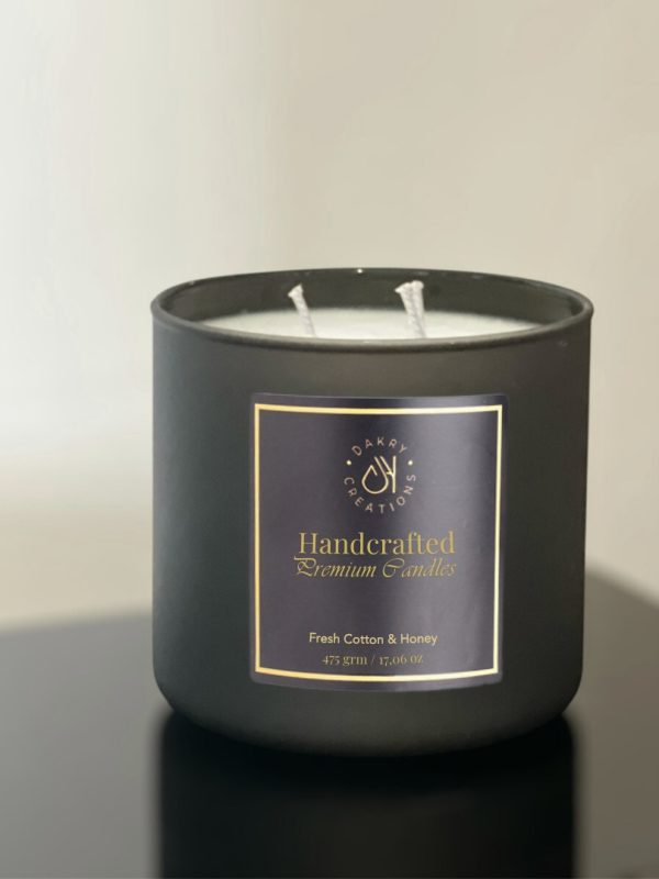 Fresh cotton and honey scented soy candle in a glass jar, 475 grams