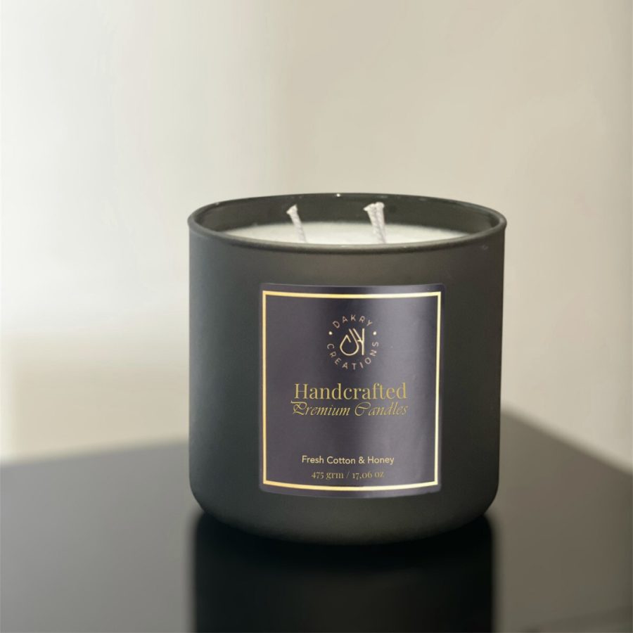 Fresh cotton and honey scented soy candle in a glass jar, 475 grams