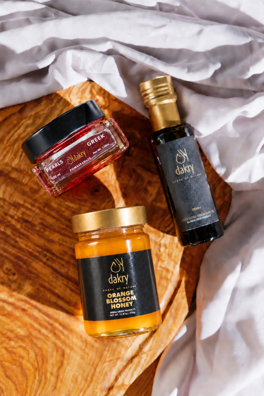Sunny Tastes gift box with Greek olive oil, orange blossom honey and pomegranate balsamic pearls by Dakry Olive
