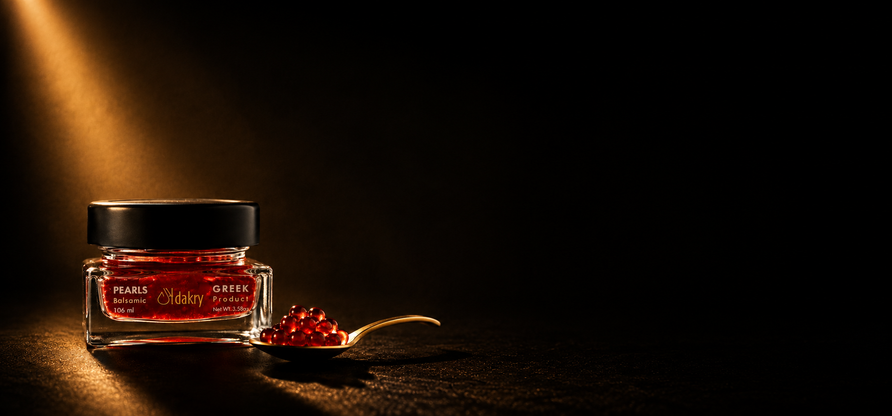 Dakry pomegranate balsamic pearls on a red background