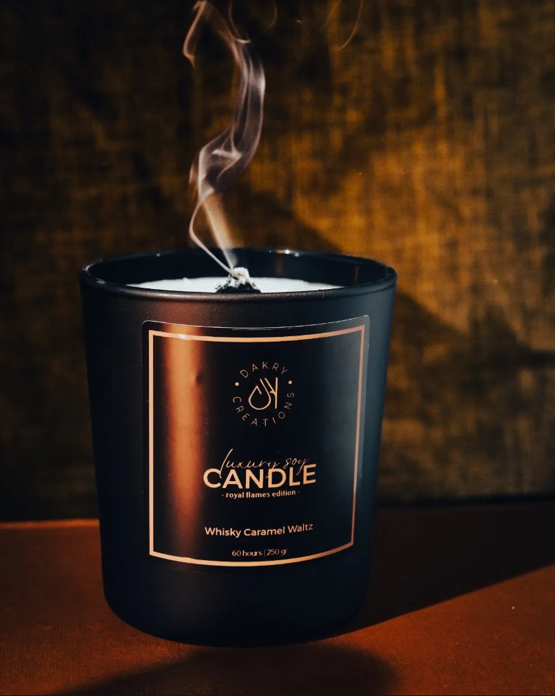 Dakry luxury soy candle, lit, close-up